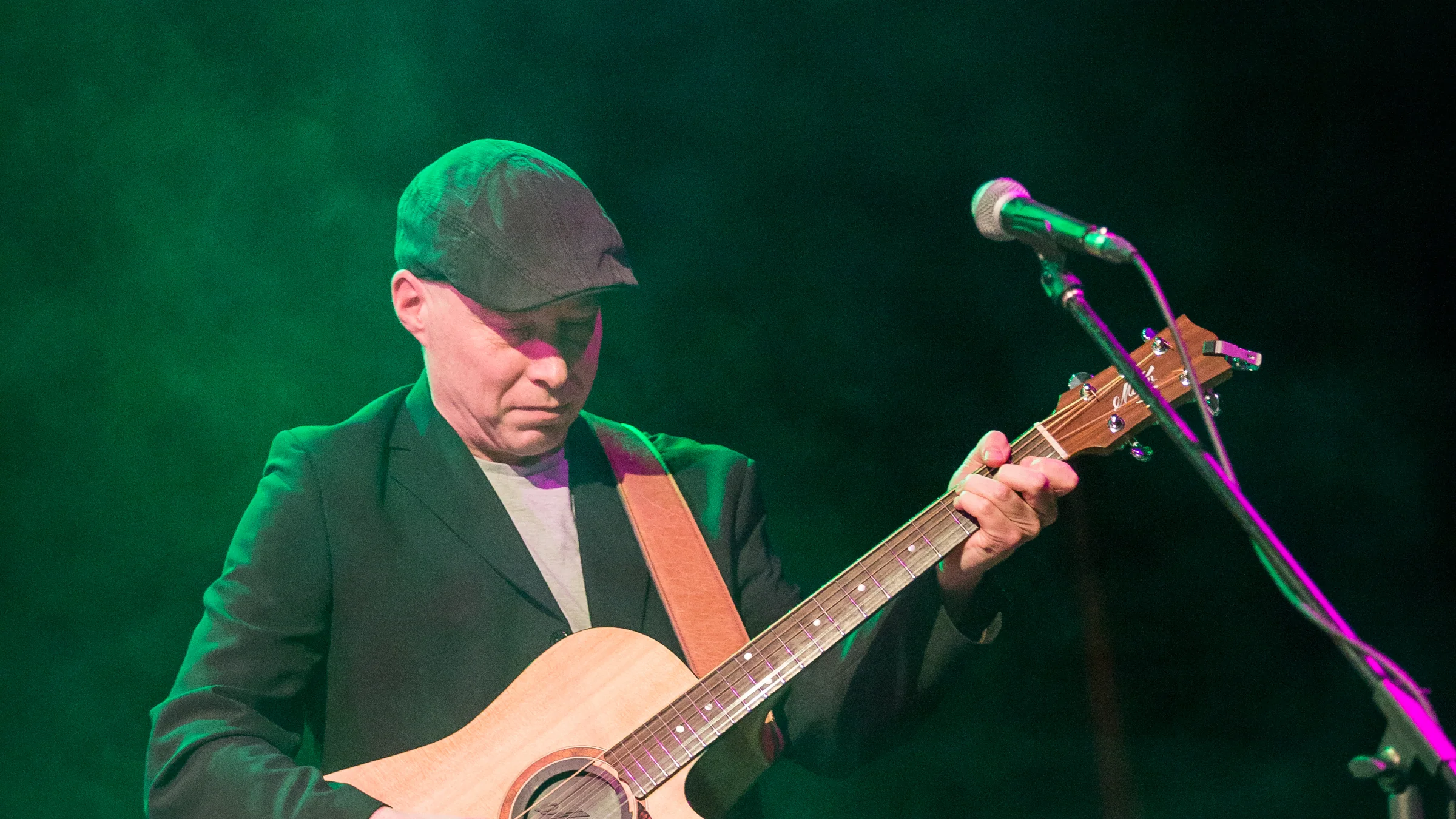 Dave Arrowsmith performing solo acoustic at Mill Arts Centre, Banbury